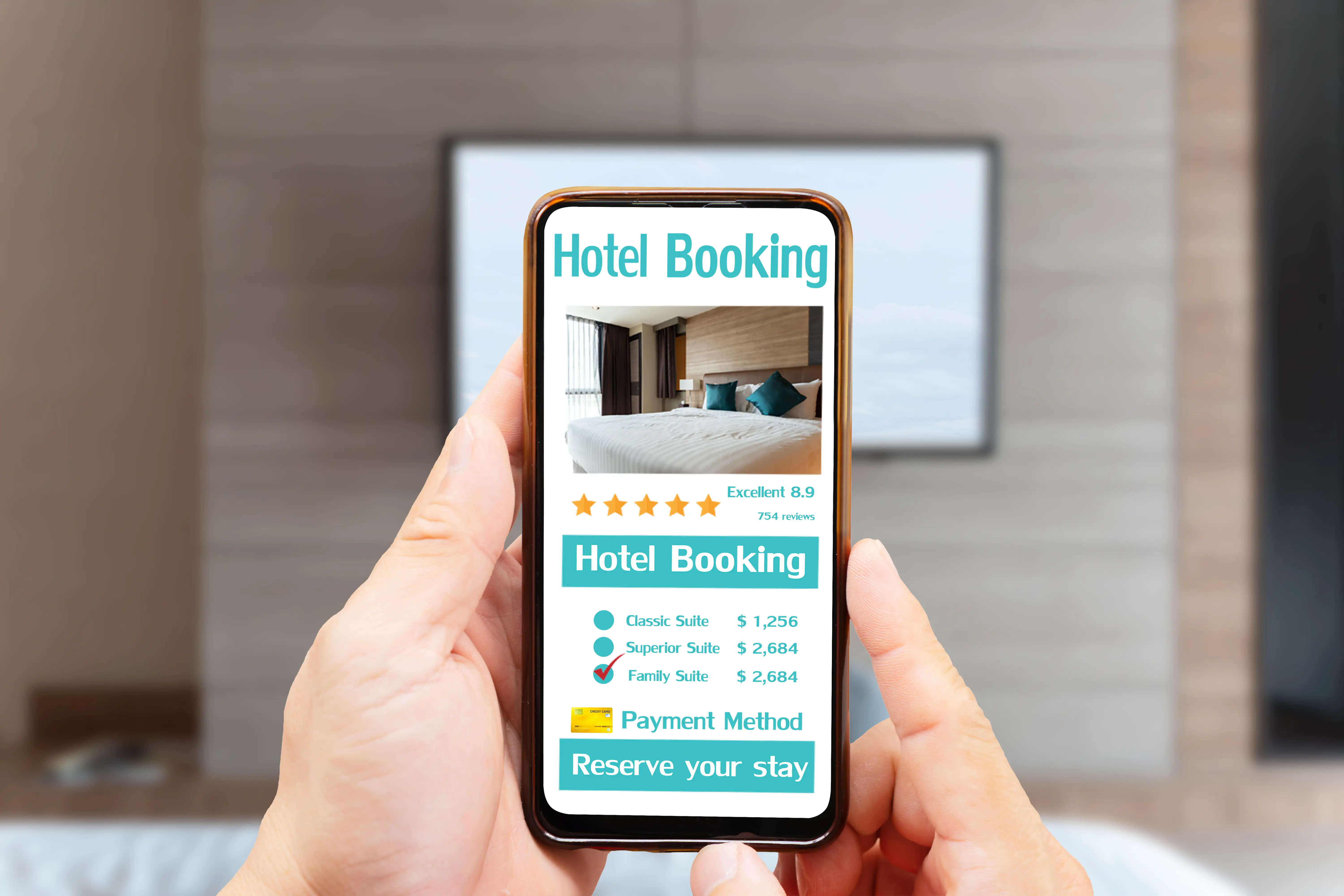Hand holding smartphone displaying hotel booking app interface with room photo, 5-star rating of 8.9, suite pricing options and reserve your stay button for accommodation reservation